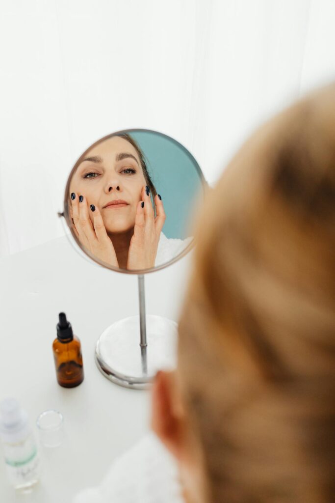 How do peptides affect collagen production and skin firmness?